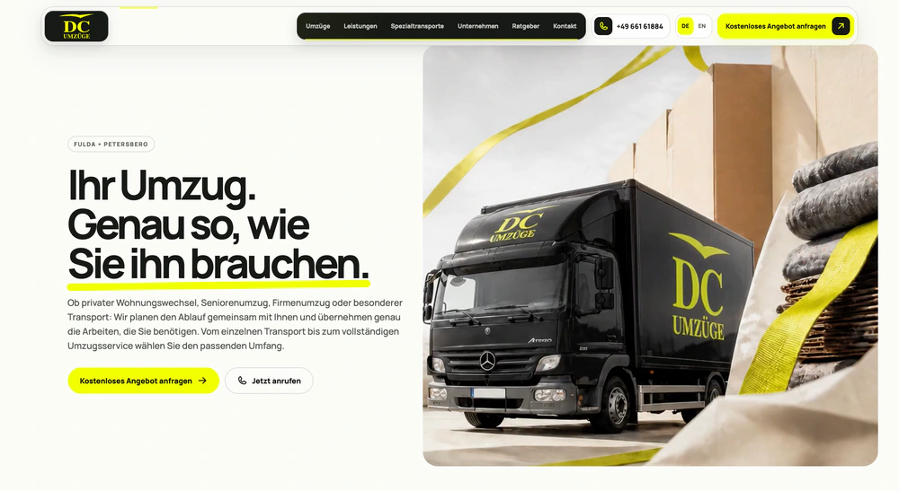 DC Umzüge: Startseite mit Leistungsversprechen und schwarzem LKW.